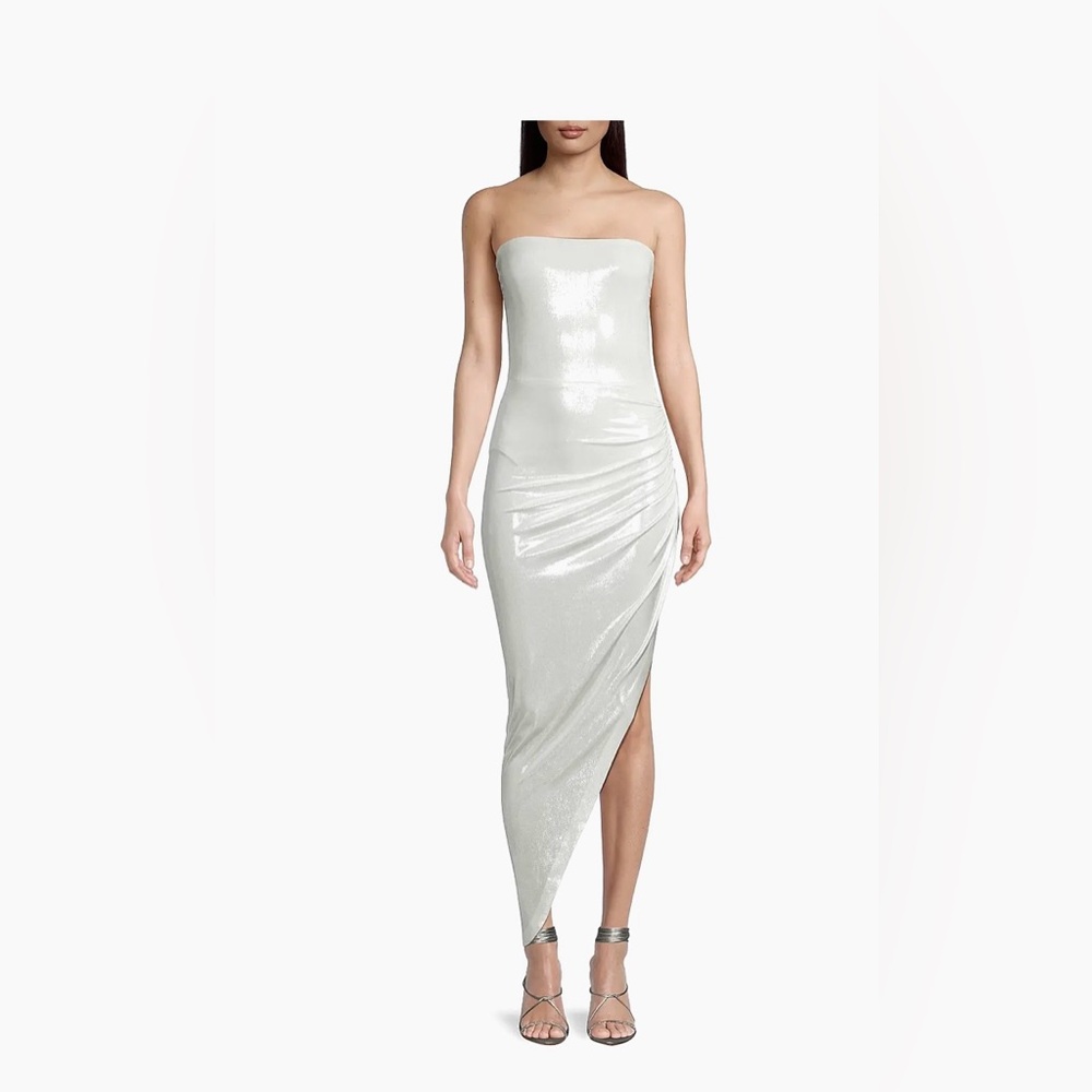 Norma Kamali's

Cut in an asymmetric silhouette, shirred strapless gown new
